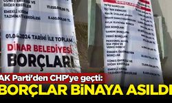 AK Parti'den CHP'ye geçti: Borçlar binaya asıldı
