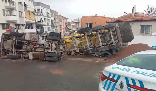 Yük boşaltırken devrilen harfiyat kamyonunun sürücüsü yaralandı